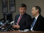 PeaceHealth Columbia Network CEO Sy Johnson, left, and Dr. Alan Melnick, Clark County Public Health director, discuss on Monday an investigation into whether a former employee exposed patients to hepatitis C.