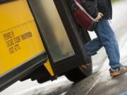 A student gets off the bus at Hockinson Heights Elementary School in 2010.