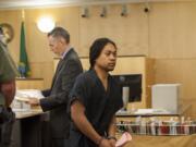 Jacky Chan Karuo appears in Clark County Superior Court Wednesday morning, Sept. 2, 2015, after Vancouver Police Department K-9 Ike was stabbed to death Tuesday night, Sept. 1, 2015.