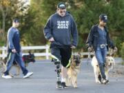 Justin Carey trains his service dog Shiva with veterans who are receiving dogs through Northwest Battle Buddies.