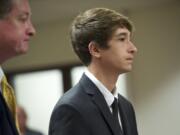 Dylan Mork pleads guilty on an arson charge in the 2013 Crestline Elementary School fire case in Clark County juvenile court on Thursday.