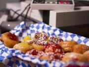 Made-to-order mini-doughnuts, Paper Tiger coffee, and organic teas are the specialties of the house at Echo Donut Lounge.