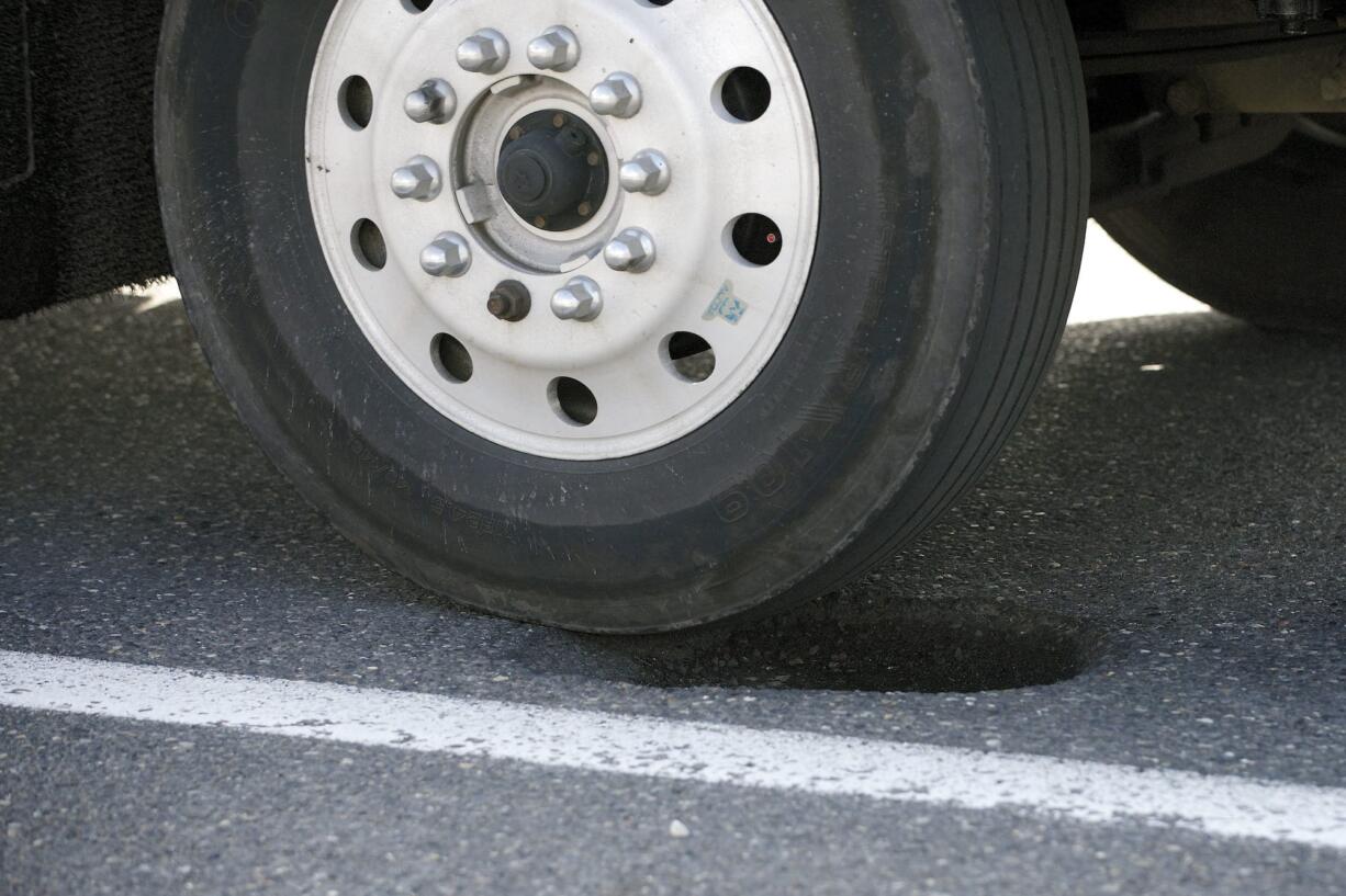 A pothole along West Mill Plain Boulevard near the intersection of St.