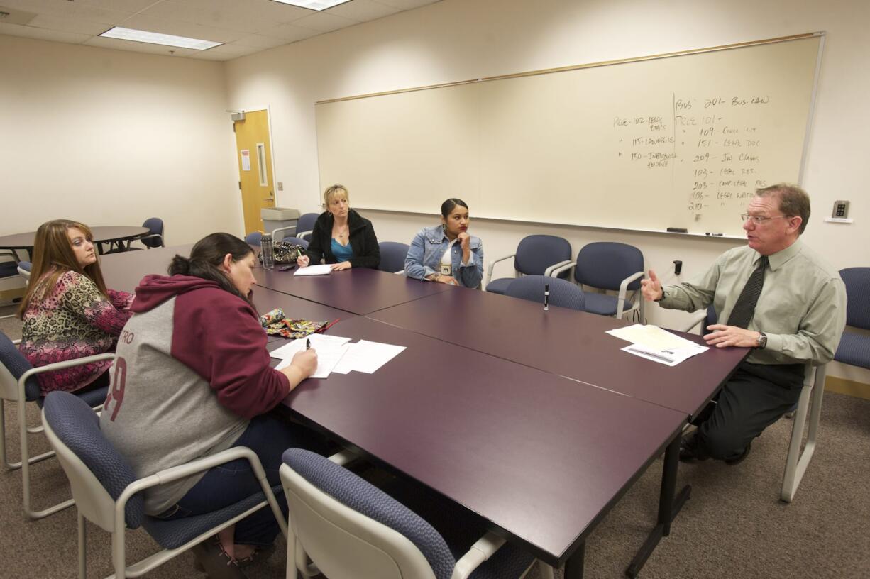 Layne Russell, paralegal program director at Clark College, talks to students about the Limited License Legal Technician program May 28.