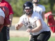 Camas defensive lineman Alex Walker was not a starter for the Papermakers in 2013, but he got lots of playing time.