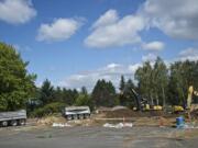 Constructions crews began preliminary work on Wednesday for Clark College's new science, technology, engineering and mathematics, or STEM, facility on the west side of Fort Vancouver Way.