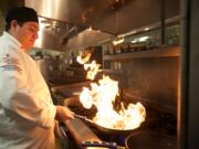 Clark County Skills Center sous chef Gerald Morales sautes beef for chipotle Baja tacos. On a recent trip to Las Vegas, Morales introduced himself to the executive chefs at two iconic restaurants, Lagasse's Stadium at the Palazzo and Restaurant Guy Savoy in Caesars Palace.