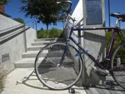 A bicycle sits locked up outside the Vancouver Community Library in downtown Vancouver.