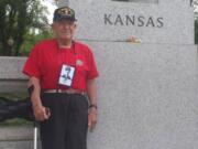 World War II veteran and former POW Dale Bowlin stands with his home state&#039;s column in the National World War II Memorial in Washington, D.C.