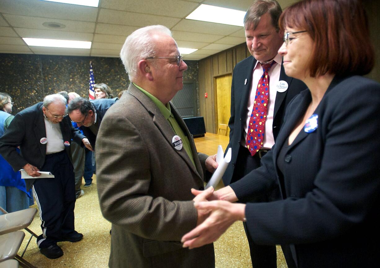 Ed Barnes, from left, Craig Pridemore and Kelly Love Parker congratulate each other after the Clark County Democrats selected and ranked them in March as their top three candidates in the order of Pridemore, Parker and Barnes, to fill the commissioner seat vacated by Steve Stuart.