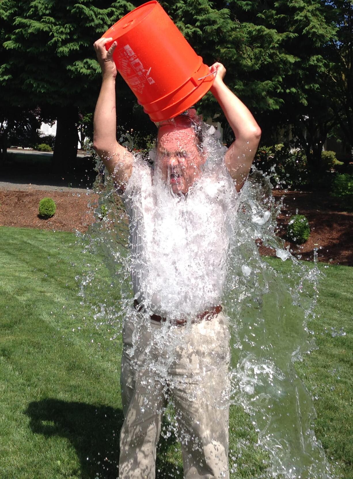 Clark County: Vancouver City Councilor Jack Burkman takes the ALS Association's Ice Bucket Challenge last month to support friend Mike Carnahan who was diagnosed with the disease 16 months ago.