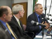 Clark County's Auditor Greg Kimsey, from left, Finance Director Mark Gassaway and Commissioner David Madore took part in the forum in April. Clark County commissioners missed Wednesday's deadline to respond to a scathing audit of a year-and-a-half-old county program that eliminates traffic impact and permit fees on nonresidential development.