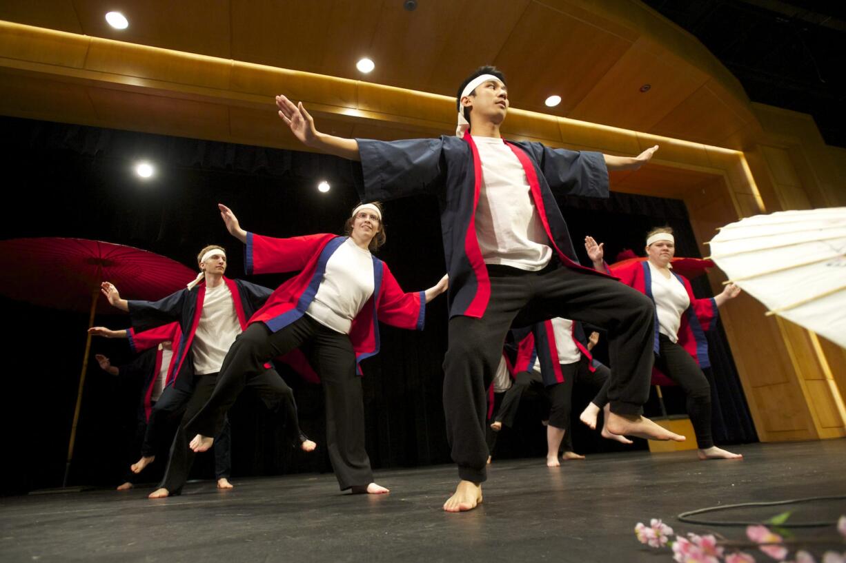 Photos by Steven Lane/The Columbian
Members of the Japanese Club perform Soran Bushi, a Japanese fishermen's dance, during the Clark College Sakura Festival.