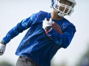 Zachary Kaufman/The Columbian
Mountain View running back Preston Jones takes reps during a drill at practice on Thursday August 21, 2014. ()