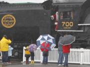 Kids and adults flock to Amtrak in Vancouver to catch a glimpse of Santa himself.