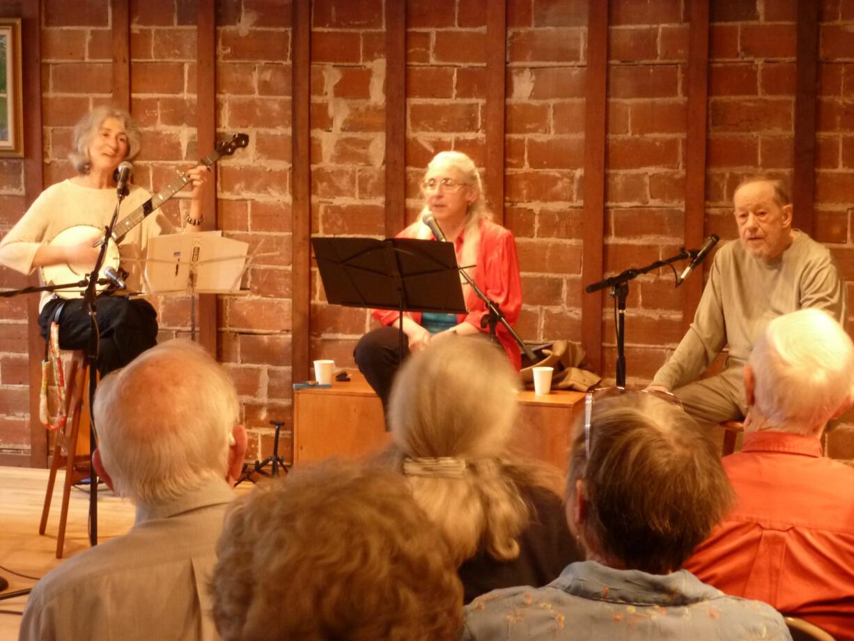 Uptown Village: Susan Lewis, from left, Janet Stecher and Joe Hickerson harmonize during a concert of labor history songs at the Clark County Historical Museum on March 15.