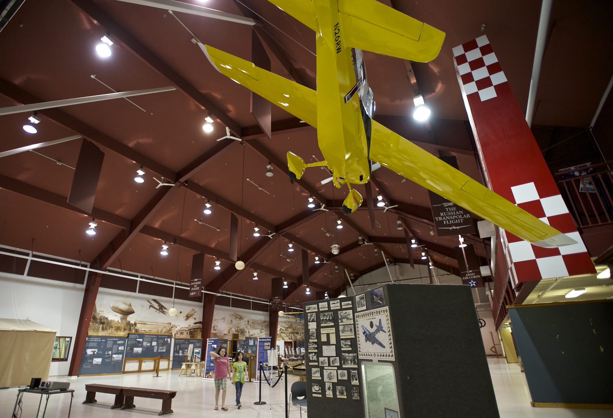 Isabell Eddy, left, 10, and Maylee Schaalje, 8, both of Vancouver, visit the Pearson Air Museum on Friday.