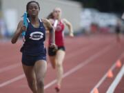 Skyview's Chisom Eke got the rare privilege of finishing ahead of Camas' Alexa Efraimson as Skyview won the girls 1,600 relay and district team title at McKenzie Stadium.