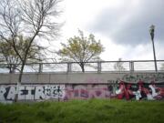 Graffiti covers the south side of the bridge that carries Mill Plain Boulevard over the railroad tracks at Lincoln Avenue on April 4.