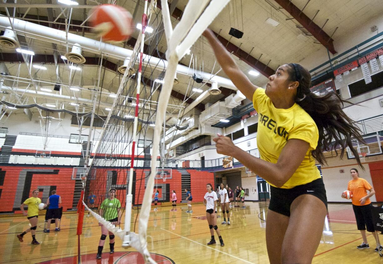 Battle Ground junior Brooke Van Sickle hits during practice on Tuesday September 2, 2014.