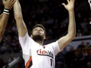 Portland Trail Blazers forward Joel Freeland pulls down one of his career-high 17 rebounds against Philadelphia.