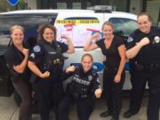 Vancouver Police DepartmentVancouver Police Department Detective Deanna Watkins, from left, Sgt. Therese Kubala, Cpl. Holly Musser, Sgt. Barbara Kipp and Officer Mary Jane Long show their support for the Girl Cops Are Awesome movement.