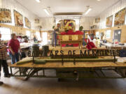 Battle Ground is celebrating its 60th year in the Rose Festival Parade. Volunteers build the 2014 float, Thursday, May 29, 2014.