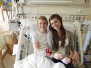 Jacob Linnell, 18, and his girlfriend, Lydia Lynch, 18, talk about the surprise mini prom staff at Legacy Salmon Creek Medical Center organized for them.