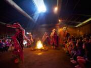 Students were entertained with stories, music and masked dancers during the one-hour program.