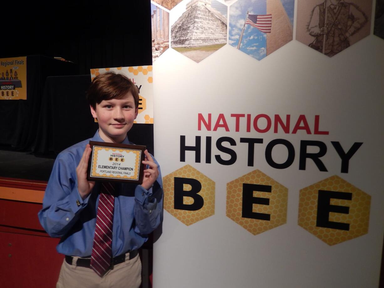 West Hazel Dell: Eisenhower Elementary fifth-grader Andrew Douglas holds his award for winning the regional championship of the National History Bee.