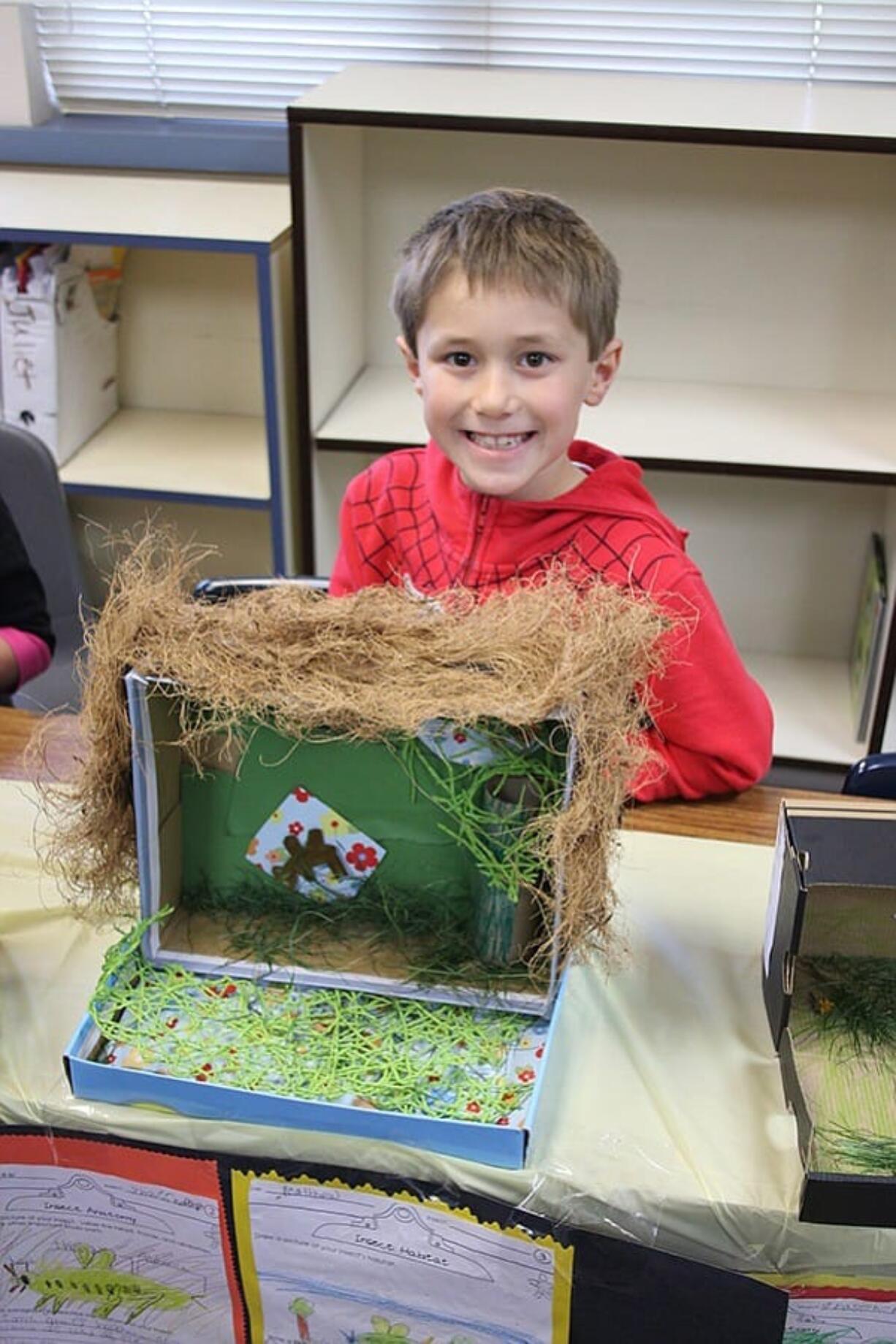 Washougal: Gause Elementary School first-grader Matthew Chilson presented on grasshoppers at the school's Insect Showcase on April 15.