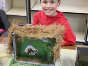 Washougal: Gause Elementary School first-grader Matthew Chilson presented on grasshoppers at the school's Insect Showcase on April 15.