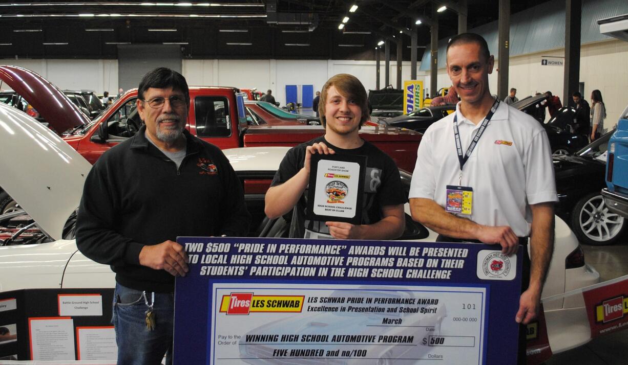 Battle Ground: Battle Ground High School senior Cameron Faley, center, won the Les Schwab Pride in Performance Award for the modified 1995 Nissan 240SX he showcased in the 59th Annual Portland Roadster Show on March 20.