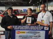 Battle Ground: Battle Ground High School senior Cameron Faley, center, won the Les Schwab Pride in Performance Award for the modified 1995 Nissan 240SX he showcased in the 59th Annual Portland Roadster Show on March 20.