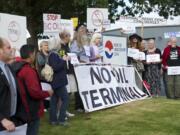 Opponents of building the Northwest's largest oil-by-rail terminal in Vancouver attend the Port of Vancouver's public hearing Tuesday. Leaders of Vancouver neighborhood associations continue to demand that port commissioners hold a public hearing to reconsider its lease with Tesoro Corp.