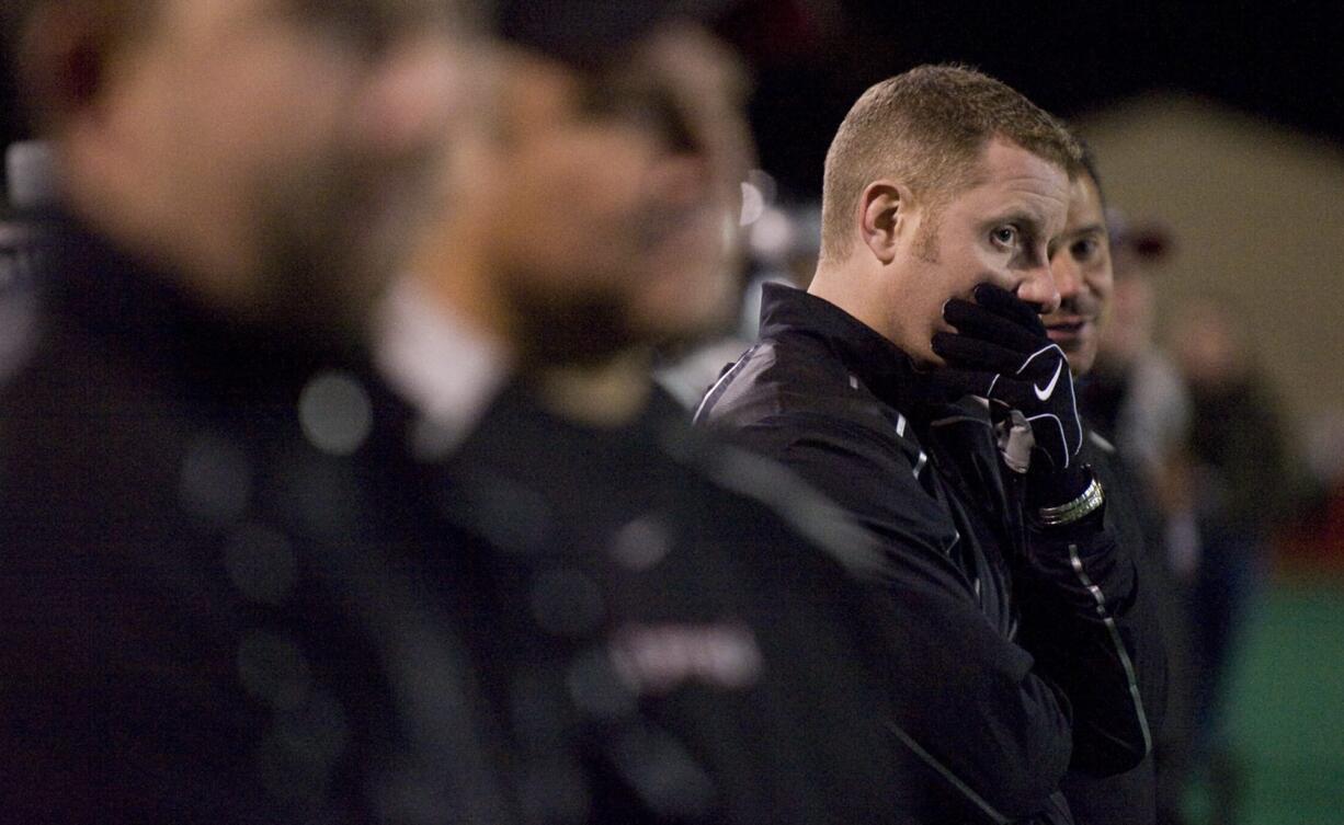 Union's head coach Cale Piland watches the fourth quarter against Olympic  at McKenzie Stadium, Friday, November 6, 2009. Union won 56-10.