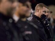 Union's head coach Cale Piland watches the fourth quarter against Olympic  at McKenzie Stadium, Friday, November 6, 2009. Union won 56-10.