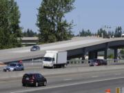 Cars use the new ramp to I-5 after WSDOT opens the new freeway interchange and the NE 139th Street bridge with a ribbon cutting at Salmon Creek in Vancouver  Wa., Wednesday August 27, 2014.