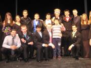 Battle Ground: Contestants and crew members of the Mr. Battle Ground Pageant stand on April 24 with 11-year-old John Hopper, for whom the students raised money for during the annual event. Top row, from left: Kyle Harris, Amanda Adler, Taylor Beardall, Hollis Cherry, Sheldon Michalios, Justin Smalley, Kaleb Armstrong, Taylor Smith, Ben Nikolas, Cassie Arrowsmith, Hana Wyles.