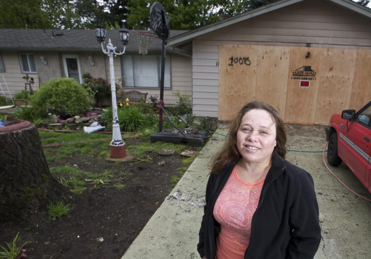 Martha Munoz, a carrier for the Columbian, had just started her delivery route when she spotted a garage fire in east Vancouver early Wednesday.