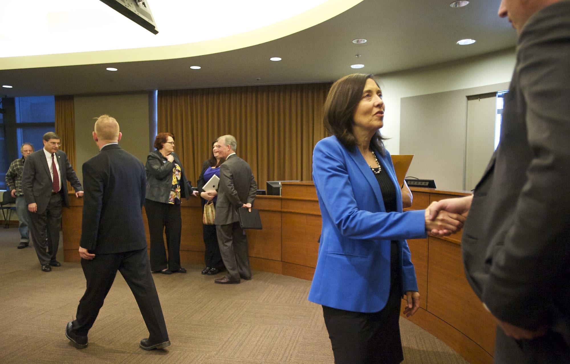 U.S. Sen. Maria Cantwell shakes hands at Vancouver City Hall Wednesday.