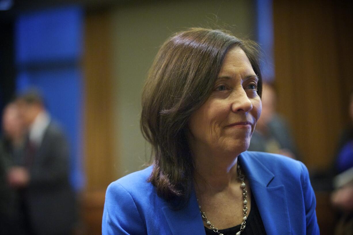 U.S. Sen. Maria Cantwell visits with local business owners at Vancouver City Hall on Wednesday.