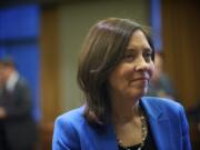 U.S. Sen. Maria Cantwell visits with local business owners at Vancouver City Hall on Wednesday.