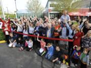 Supporters, staff and dignitaries gather Saturday to celebrate the ribbon cutting and grand reopening of the Clark County Family YMCA.