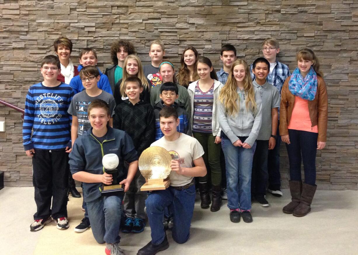 Battle Ground: Students in the Chief Umtuch Middle School Jazz Band show the trophies they received at the Skyview Jazz Festival on Dec.