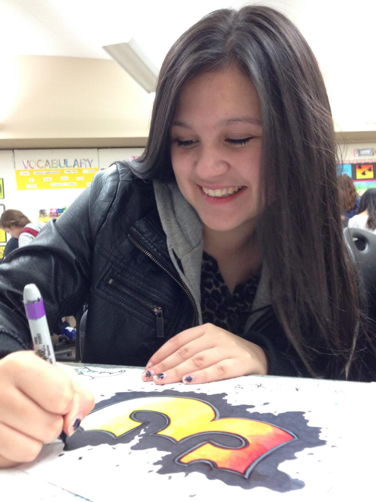 Brush Prairie: Laurin Middle School eighth-grader Katelyn Day creates art in school. A public art exhibit featuring 160 works by students will be on display until Jan.