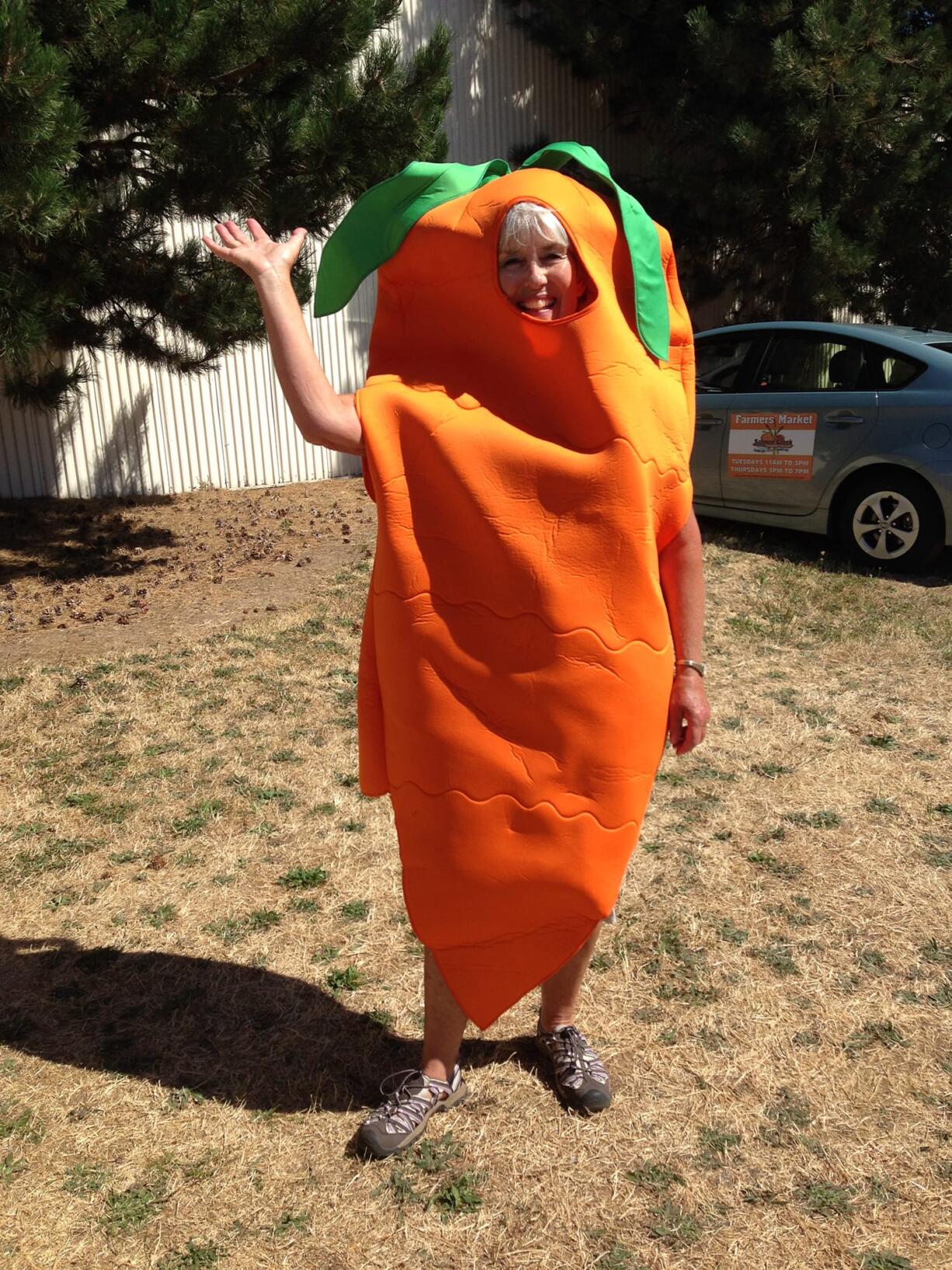 Salmon Creek: Ann Foster, organizer of the Salmon Creek Farmers' Markets, models an outfit inspired by the produce on sale at the market before it closed on Sept.