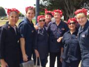 Battle Ground: Adeena Rose Wade, second from left, was part of a world record gathering of Rosie the Riveter lookalies in Richmond, Calif., on Aug.