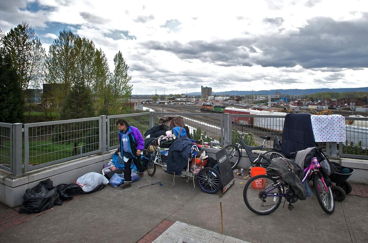 Deana Lentz, 43, has been homeless off and on for the past 20 years and is now suffering from uterine cancer, she said. She and her boyfriend &quot;don't go for shelters&quot; and were spotted living in their own camp atop the Mill Plain Extension bridge one Friday in April.