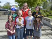 Washougal: The Swashbucklers, from Cape Horn-Skye Elementary, show off the trophy the students won during the Washougal School District's first Battle of the Books. Back row, from left: Gavin Keyser, Cape Horn-Skye Elementary Library Assistant Tammy Asbjornsen and Brynn Haralson.